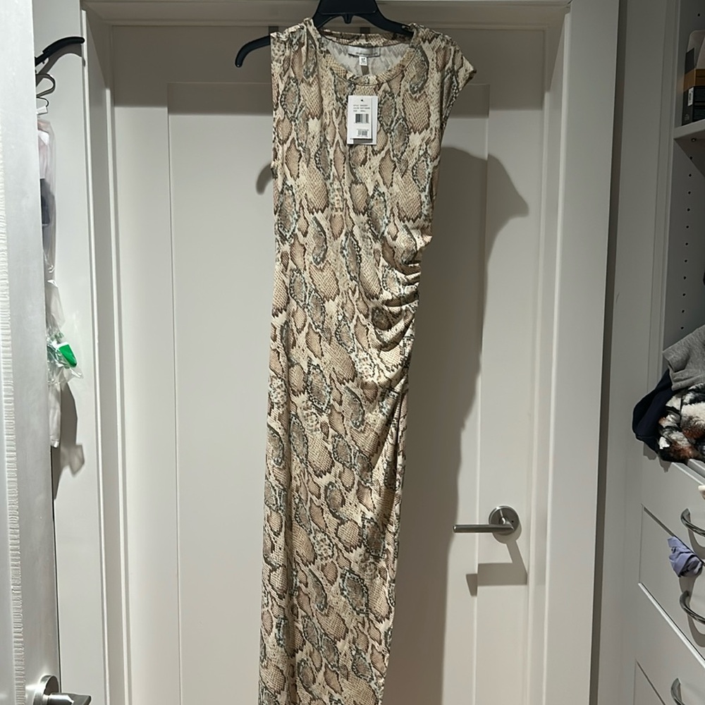 Long snake skin dress. Never worn. Fit to body